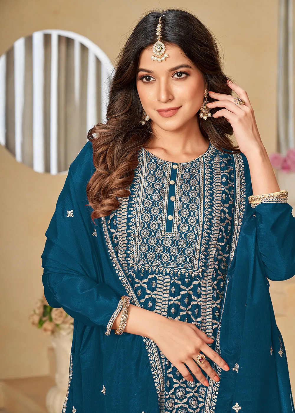 Chinnon Peacock Blue Embroidered Palazzo Salwar Suit