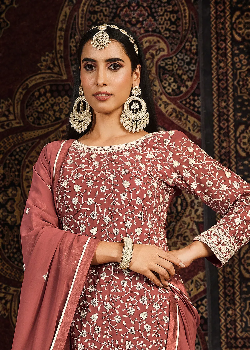 Festive Rust Color Faux Georgette Palazzo Salwar Suit