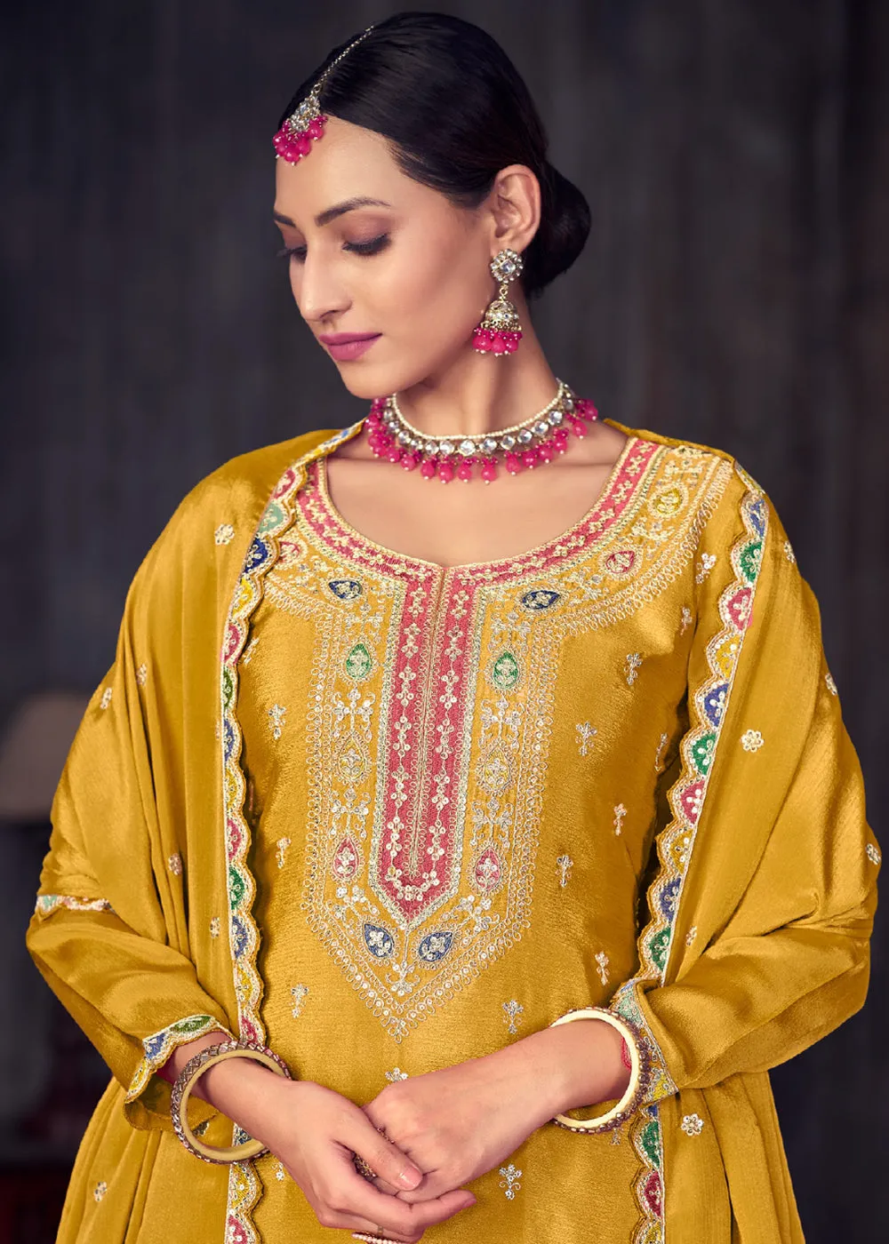 Mustard Heavy Chinnon Embroidered Lehenga Kurta Suit