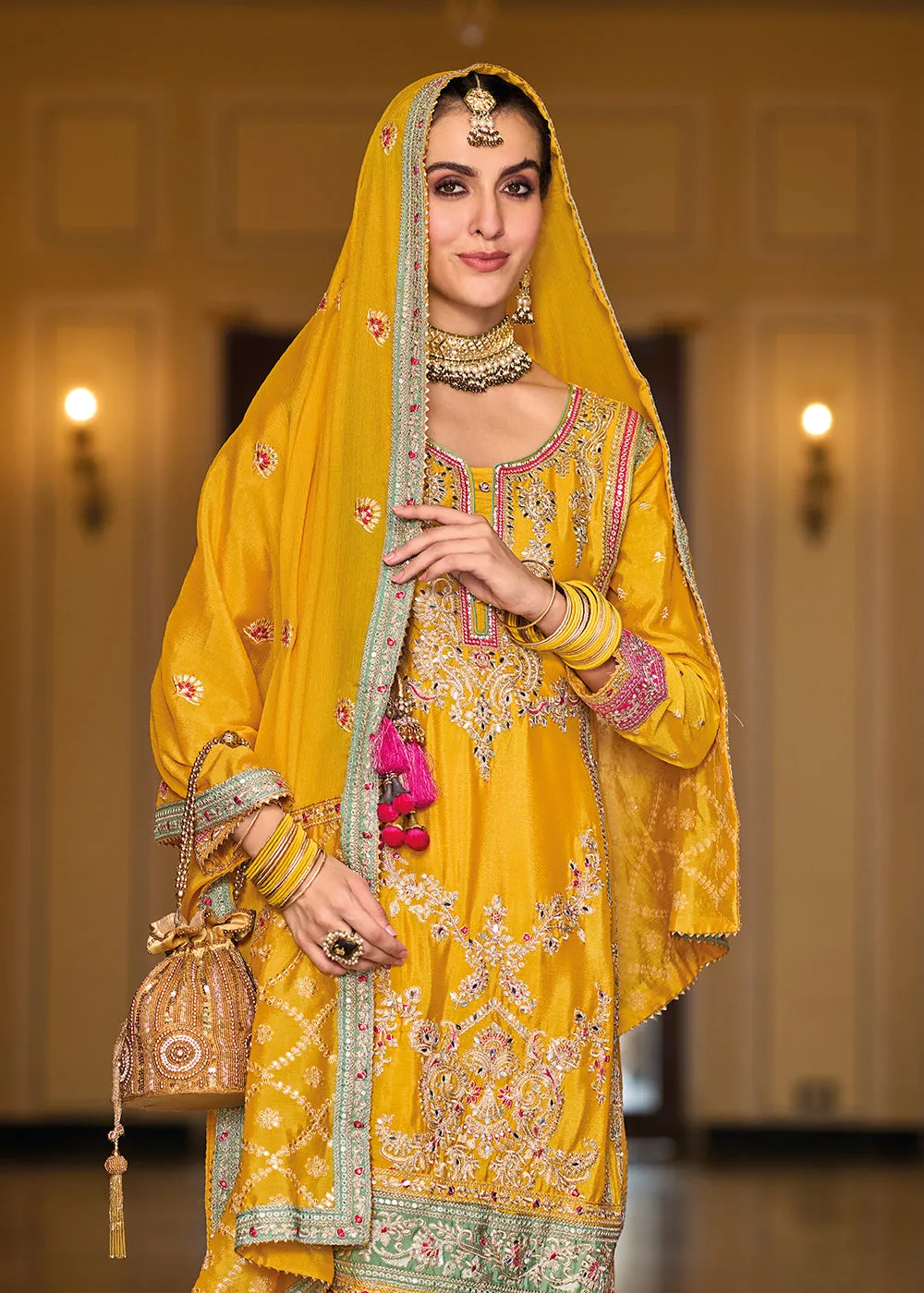 Palazzo Style Chinnon Yellow Embroidered Festive Suit