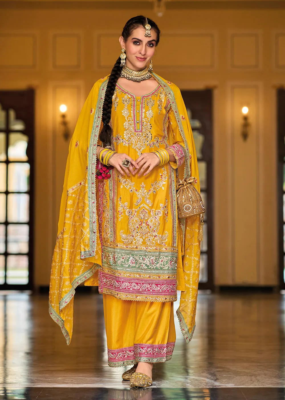 Palazzo Style Chinnon Yellow Embroidered Festive Suit