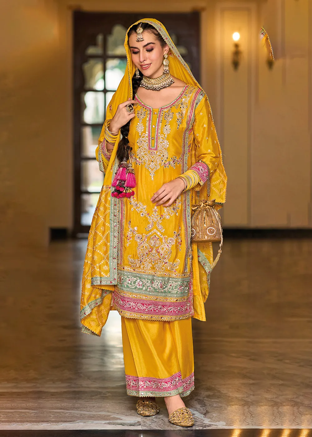 Palazzo Style Chinnon Yellow Embroidered Festive Suit