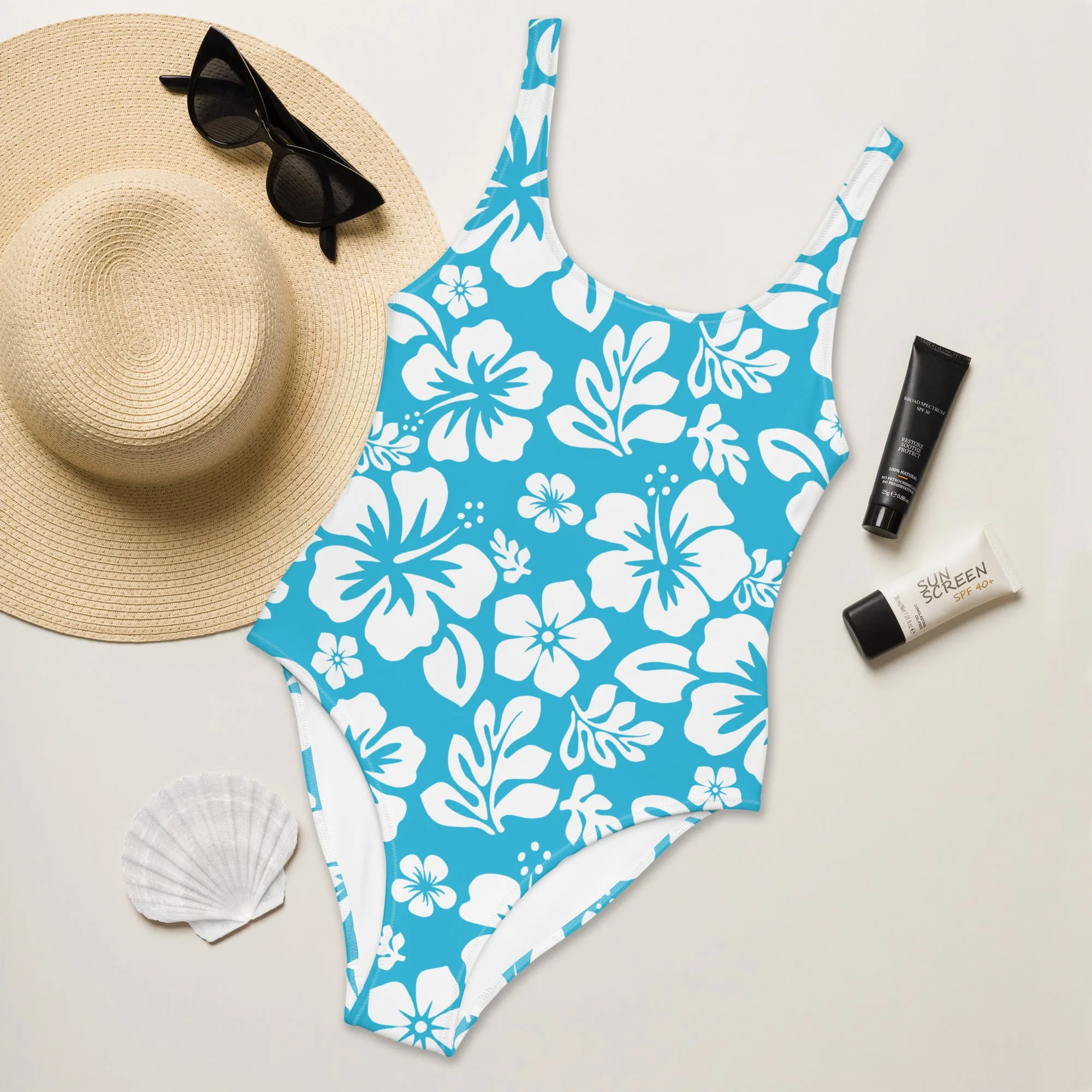 White Hawaiian Flowers on Aqua Blue One-Piece Swimsuit